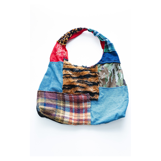 Patchwrk Hobo Bag front view showing the full patchwork body and shoulder strap